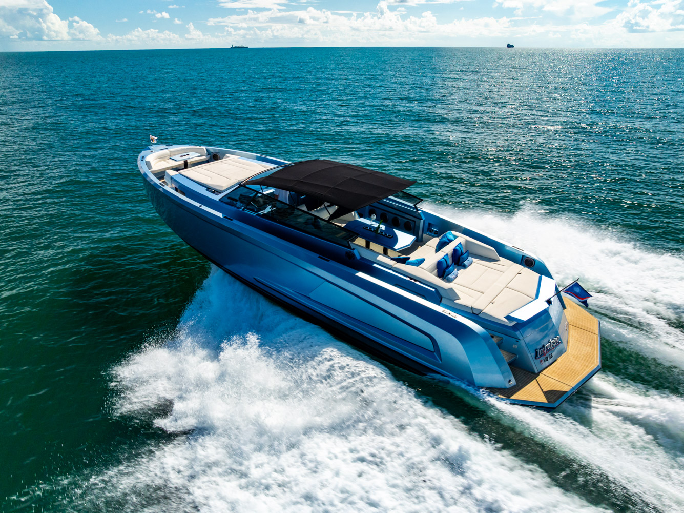 IMPULSIVE, a metallic blue 2019 Vanquish VQ58 Open, running off Miami